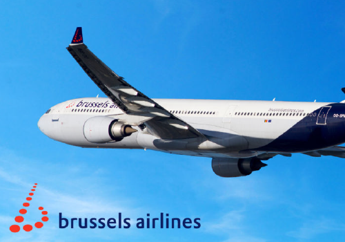 A Brussels Airlines aircraft flying against a blue sky with the Brussels Airline logo in the bottom left